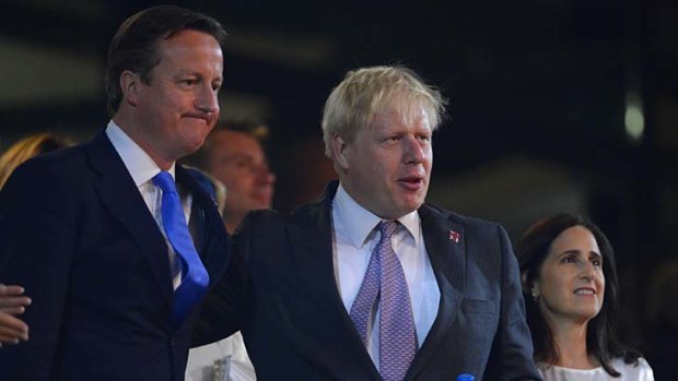 Boris Johnson, centre, pictured with British Prime Minister David Cameron during the opening ceremony.