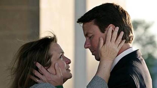 Elizabeth and John Edwards  ... a "day-to-day thing".