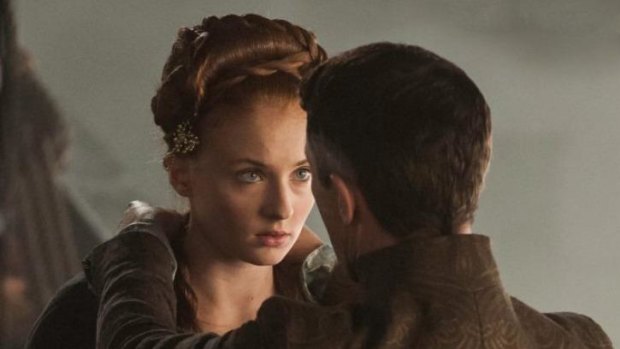 Yuck ... Sansa Stark gets a dangerous kiss from Petyr 'Littlefinger' Baelish with jealous auntie Lysa Arryn watching.