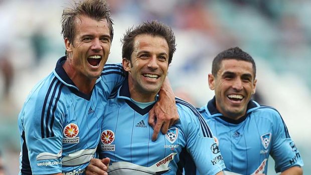 Goal-den moment: Alessandro Del Piero (centre) celebrates one of his four goals with teammates Joel Griffiths (left) and Al Abbas.