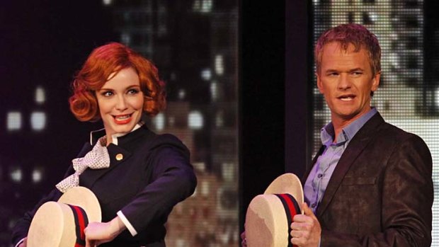 Neil Patrick Harris and Christina Hendricks perform with the cast of Company during the 65th annual Tony Awards.