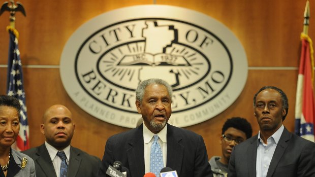 'You could not even compare this with Ferguson' ... Mayor Theodore Hoskins, centre, addresses the media over the latest police shooting at the City of Berkeley City Hall.