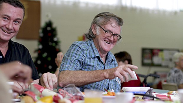 Special day ... Robert Pearce, right, enjoys a Christmas feast with lunch co-ordinator Michael Tudor from Micah Projects.