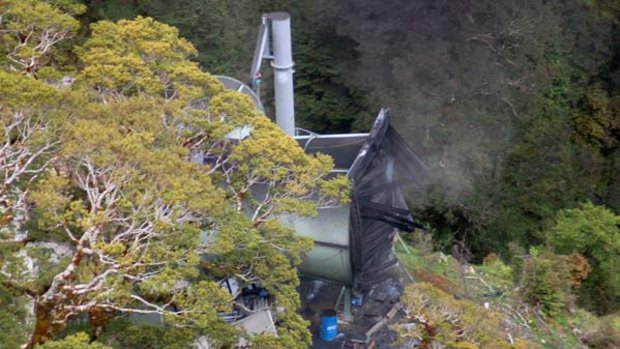 Smoke comes from the Pike River Coal Mine portal where  29 coal miners are trapped underground.