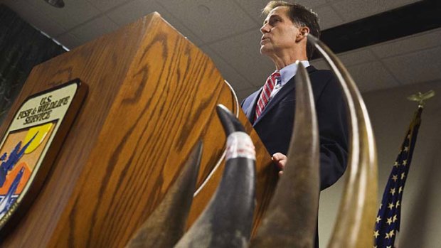 US Fish and Wildlife Service director Dan Ashe  unveils the indictment during a news conference in Montgomery. The horns on display are from previous cases, not related to the indictments.