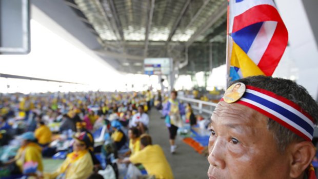 An anti-government protester looks on at a rally at Suvarnabhumi airport in Bangkok.