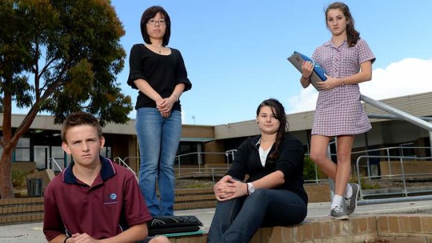 Kurnai College students Jack Findlay (left), teacher Kathy Tan, Caitlin Slater and Jessica Fossati are feeling the effects of budget cuts.