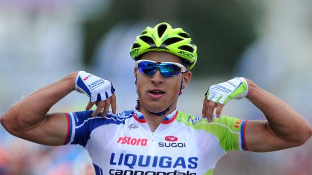 Slovakia's Peter Sagan celebrates at the finish line as he wins the 198-km first stage of the 2012 Tour de France.