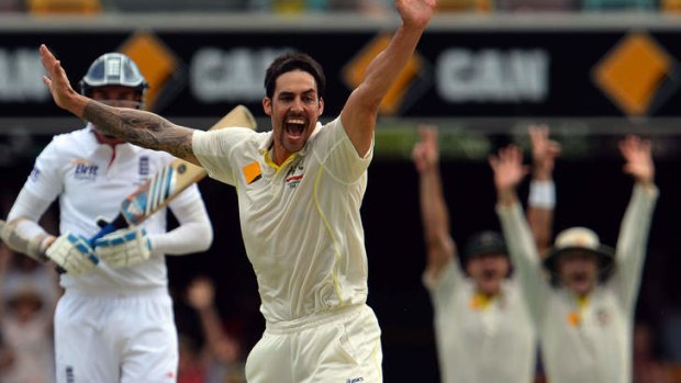 Lethal weapon: Australian fast bowler Mitchell Johnson celebrates the dismissal of England's Stuart Broad.