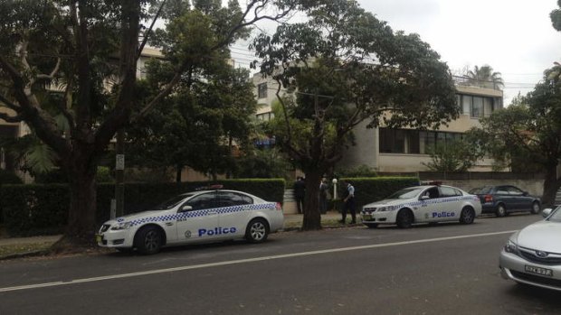 Mystery: Detectives talk to residents of Watson Street in Neutral Bay.
