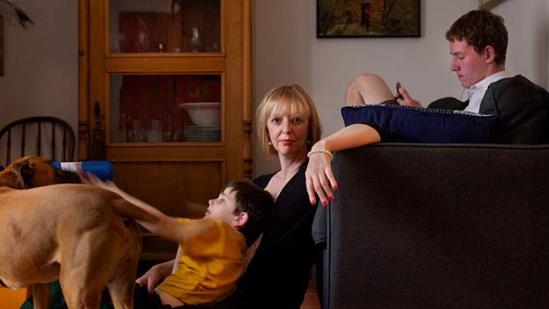 Stretched: working single mother Janet Beaumont at home with her sons, Jack and Thom.