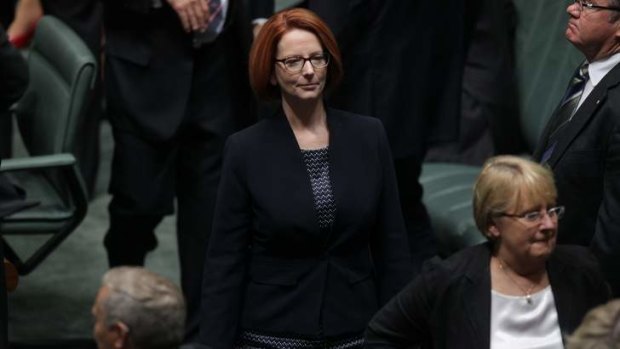 Prime Minister Julia Gillard leaves the chamber after a division in the House of Representatives on Tuesday.
