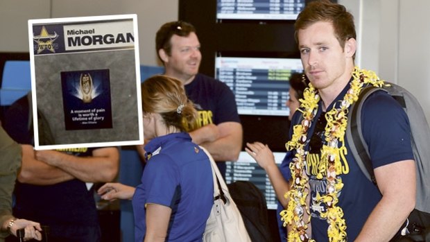 Michael Morgan, arriving at Townsville Airport on Monday and, inset, the quote inspired by his late teammate Alex Elisala.