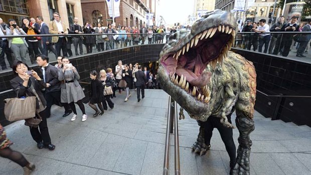 Attack of the T-Rex: Martin Place is transported back to the Jurassic age, as animated dinosaurs roamed the streets.
