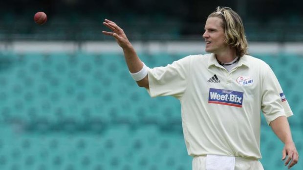 Set for court: Nathan Bracken, seen here playing for NSW in 2008, and Cricket Australia.
