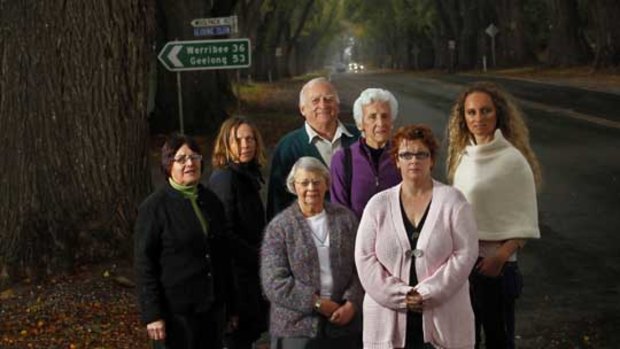 Heather Mui, Janie Garner, Gwen Rasdell, John Murphy, Heather Shugg, Katrina Bradfield and Belinda Dellios are opposing a roundabout on the Avenue of Honour in Bacchus Marsh.