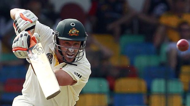 Michael Hussey plays a shot on his way to the 15th century of his Test career