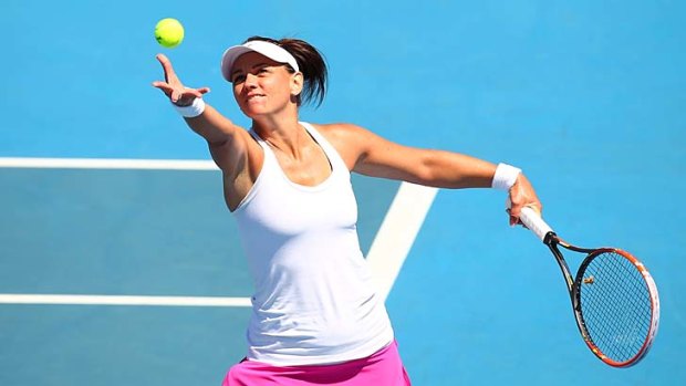 Flying start: Casey Dellacqua put Australia up with a straight-sets victory over Russian Irina Khromacheva in the Fed Cup.