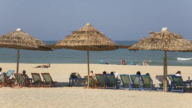 Fly and flop: holidaymakers on Cua Dai Beach.