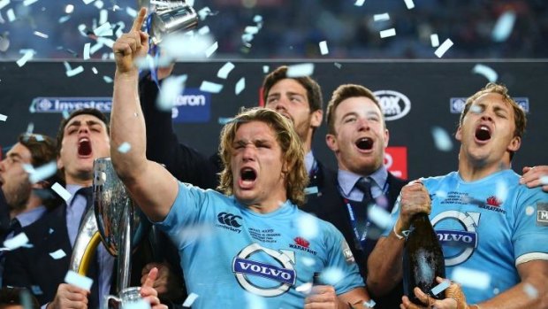 Top Tah ... Michael Hooper celebrates after winning the Super Rugby title.