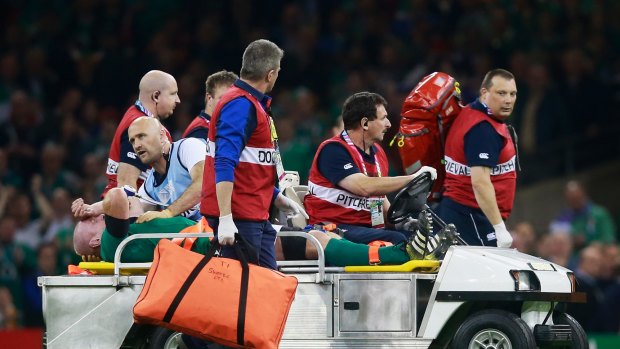 Sad ending: Paul O'Connell of Ireland is stretchered off in Cardiff.