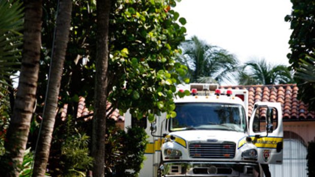 Ambulance crews at the house of Jeffry Picower, who was found dead at the bottom of his pool.