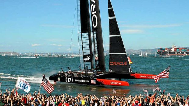 Oracle Team USA crosses the finish line to win race 15.