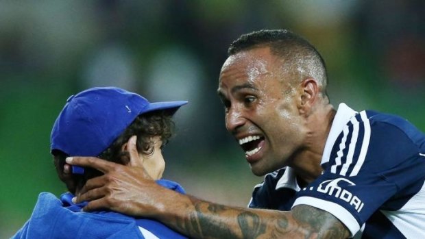 Archie Thompson with his son, Axel.