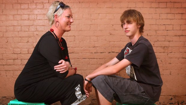Tracy Bartram with her son Max, 15, whose passion for drumming has helped him manage his Tourette Syndrome.
