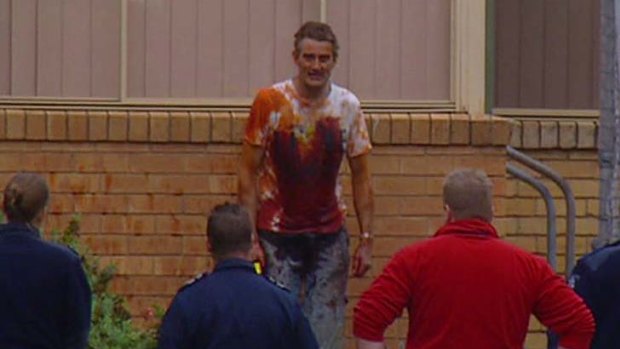 David Hopkins is cornered by police at a Bayswater church after he set fire to Nicole Millar.