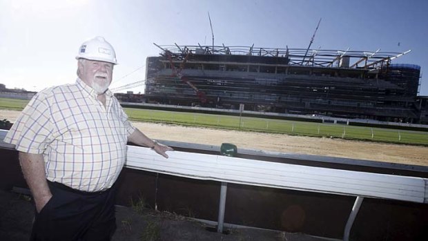 Taking shape &#8230; the ATC chairman, John Cornish, and the $160 million grandstand at Royal Randwick.
