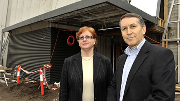 Principal Michele Bernshaw and president Michael Lawrence outside the new school hall.