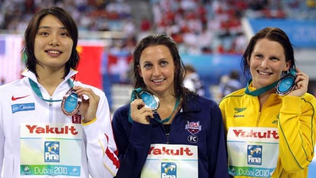 Gole medal winner Rebecca Soni (centre) on the podium with Australia's silver medallist Leisel Jones and China's bronze winner Ji Liping.
