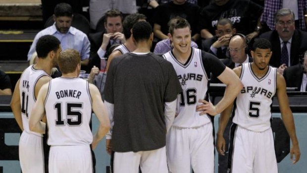 San Antonio centre Aron Baynes shares a laugh with his teammates during the big win over the Thunder in game two of the Western Conference finals.