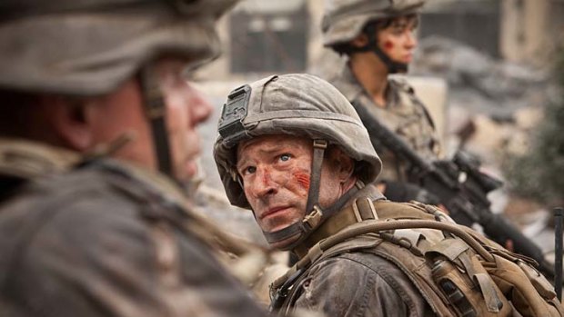 Aaron Eckhart is shaken, battled and... well shaken and battled a bit more in <i>Battle: Los Angeles</i>.