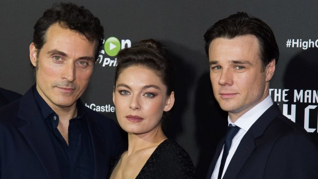 Rufus Sewell, left, Alexa Davalos and Rupert Evans attend the premiere of the Amazon original series 