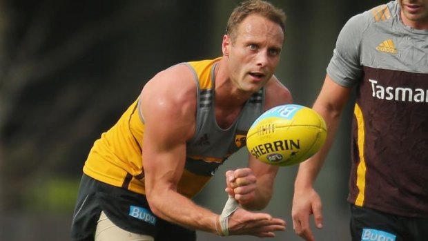 Waiting game: Will Brad Sewell return to Hawthorn's side for the grand final?