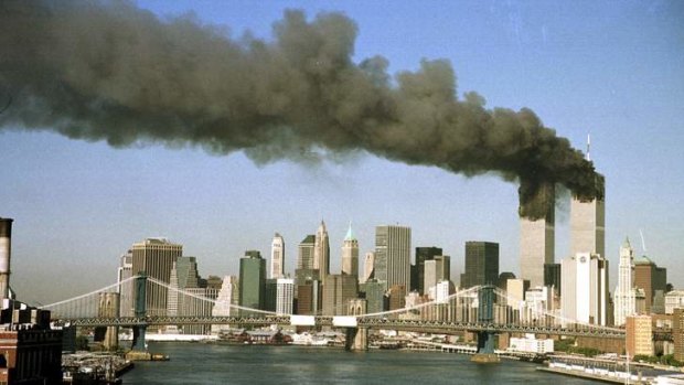 The twin towers of the World Trade Center pour smoke in New York on September 11, 2001.