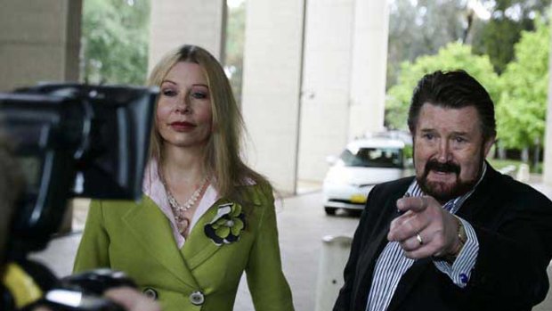 Derryn Hinch and wife Chanel appearing at the high court in Canberra.