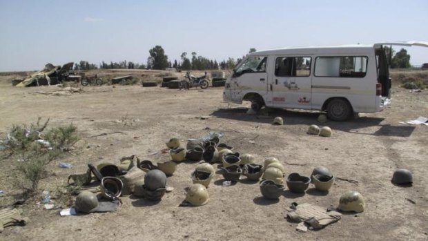Abandoned Iraqi military helmets outside Kirkuk.