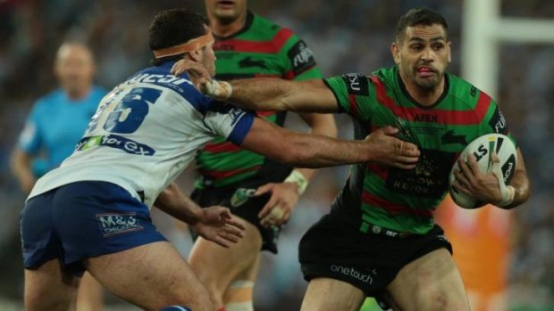 Keeping the Bulldogs at arm's length: Greg Inglis.