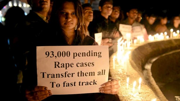 Indian protesters held a rally in Ahmedabad following the cremation of a gang-rape victim.