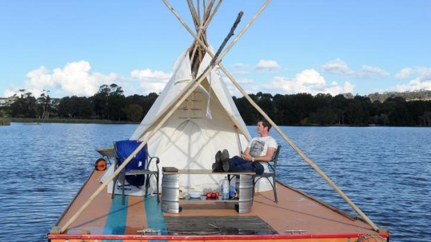 William Woodbridge maintains his teepee raft protest  on Lake Ginninderra. He is angry about housing affordability for students in Canberra.