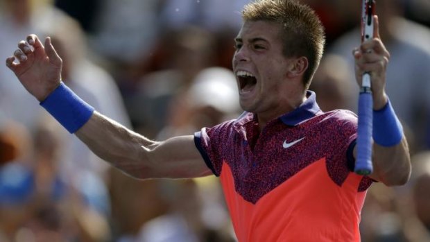 Borna Coric, of Croatia, reacts after defeating Lukas Rosol, of the Czech Republic.
