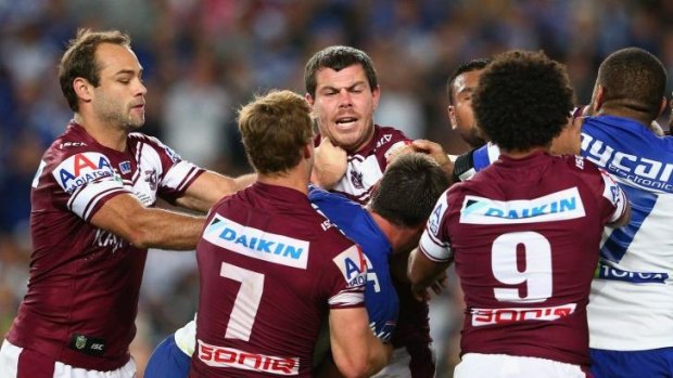 Josh Jackson of the Bulldogs and Josh Starling of the Sea Eagles have an altercation on Saturday night.