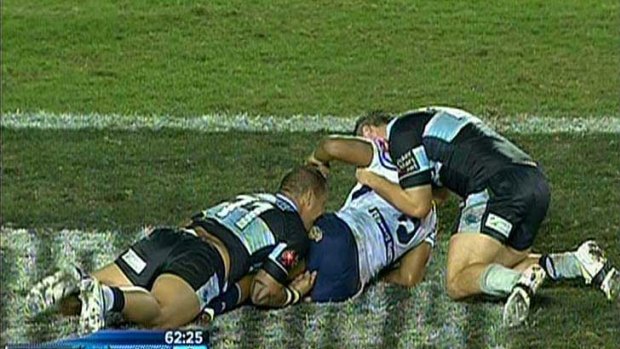 Finger of fate ... a still from last week's Cronulla-North Queensland match appears to show Sharks forward Jeremy Smith pressing a digit to the backside of Cowboy Kalifa Faifai Loa - but the committee found there was "no pressure applied" and let the Kiwi off with a caution.