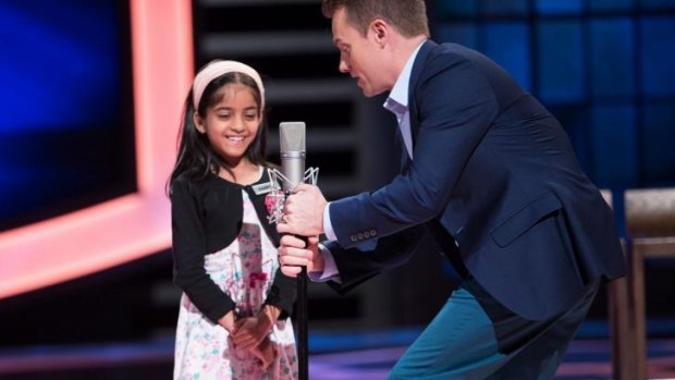 Grant Denyer prepares Harpita for her turn on Channel Ten's <i>The Great Australian Spelling Bee</i>.