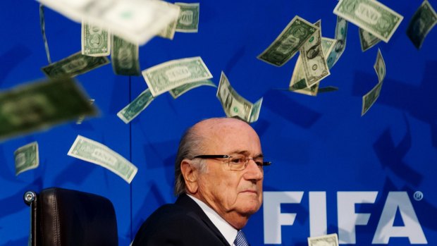 Comedian Simon Brodkin (not pictured) threw dollar bills at FIFA president Joseph S. Blatter at a press conference in July.