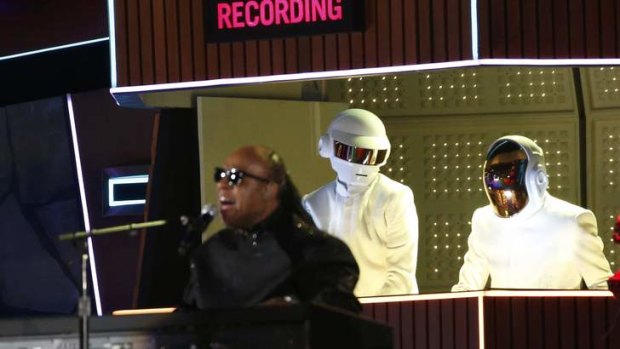 Stevie Wonder (front) performs <i>Get Lucky</i> with Daft Punk.