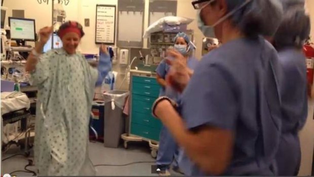 Deborah Cohan danced with the medical team at Mt. Zion Hospital in San Francisco minutes before undergoing surgery to have both breasts removed.